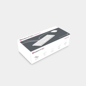 Kit Raspberry Pi 500+, boîte d'emballage illustrant le clavier et la souris fournis