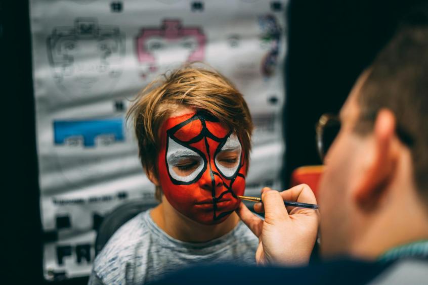 man painted boy s face