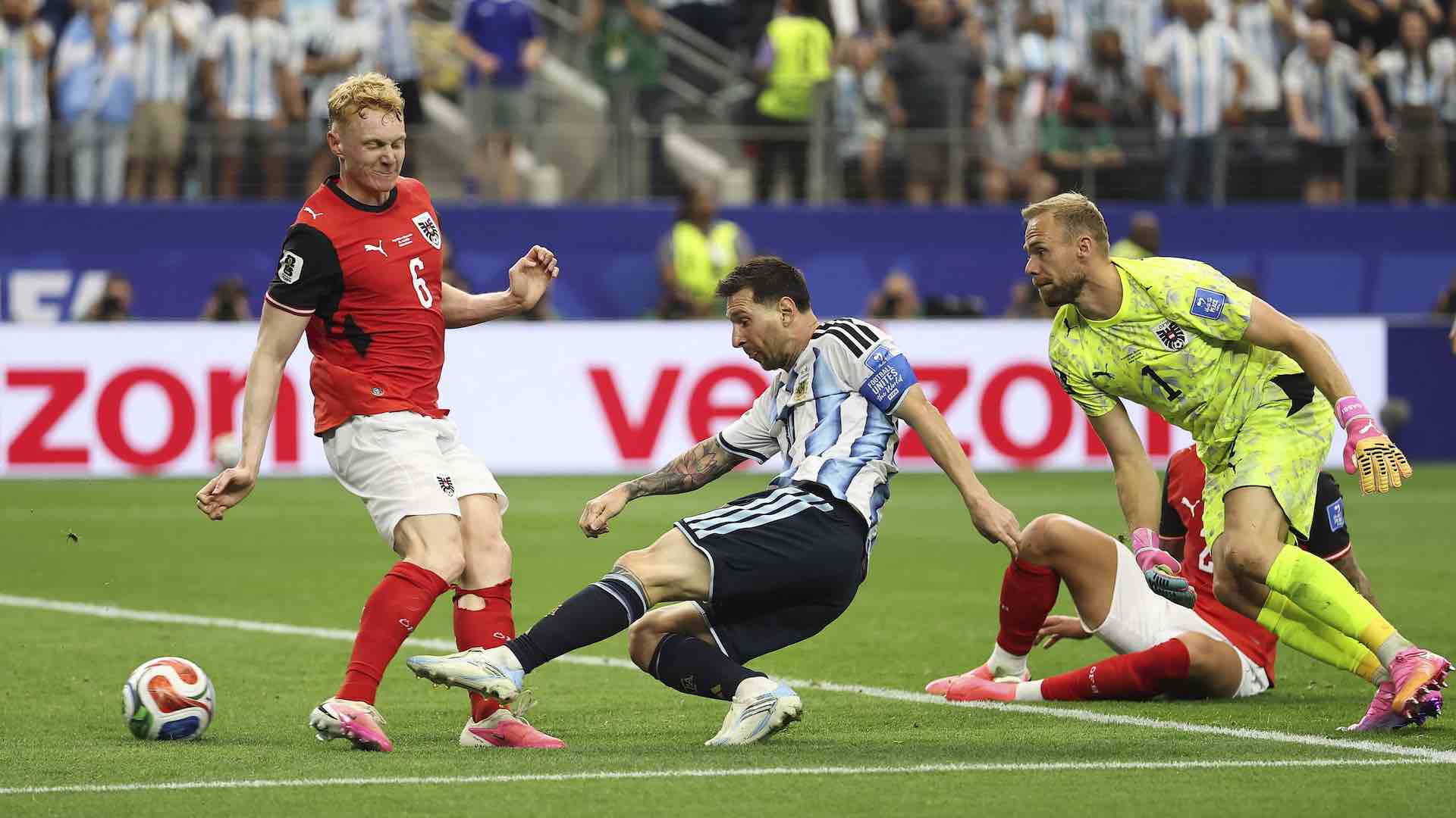 Argentina advance as Messi breaks World Cup scoring record