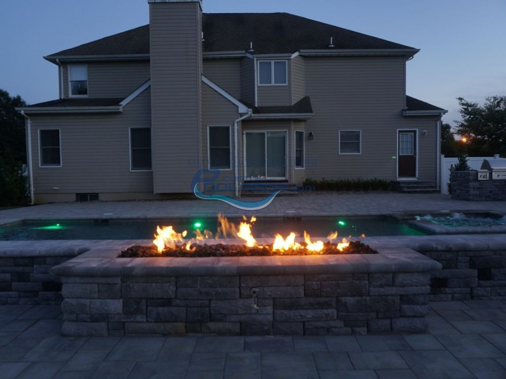Fire Pit in Raised Beam of Pool