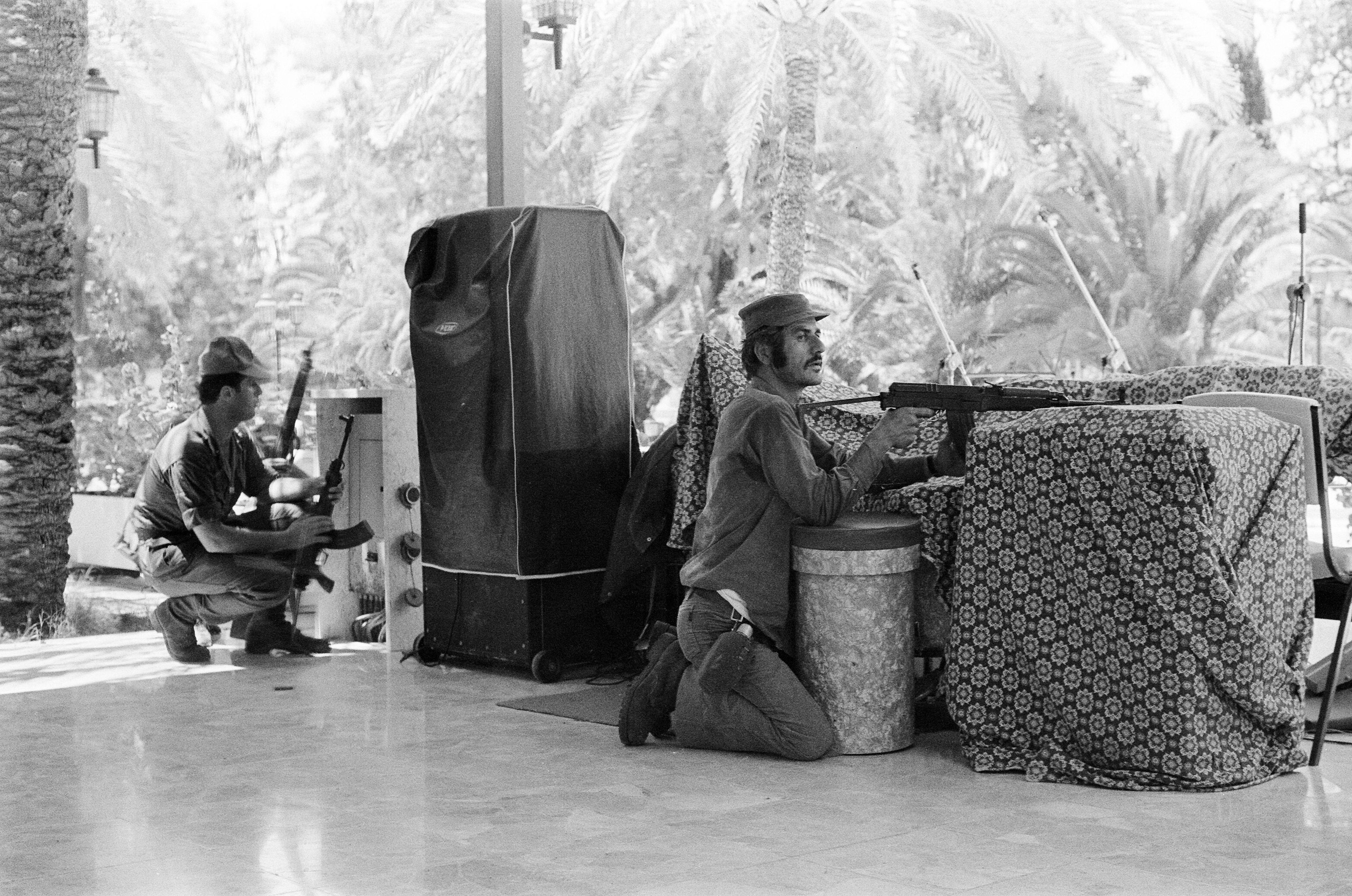 Greek Cypriot soldiers inside the Ledra Palace Hotel, during the Turkish invasion of Cyprus. The Ledra Palace Hotel became the centre of fighting with the Greek Cypriot soldiers keeping residents and journalists in the hotel. 22nd July 1974.