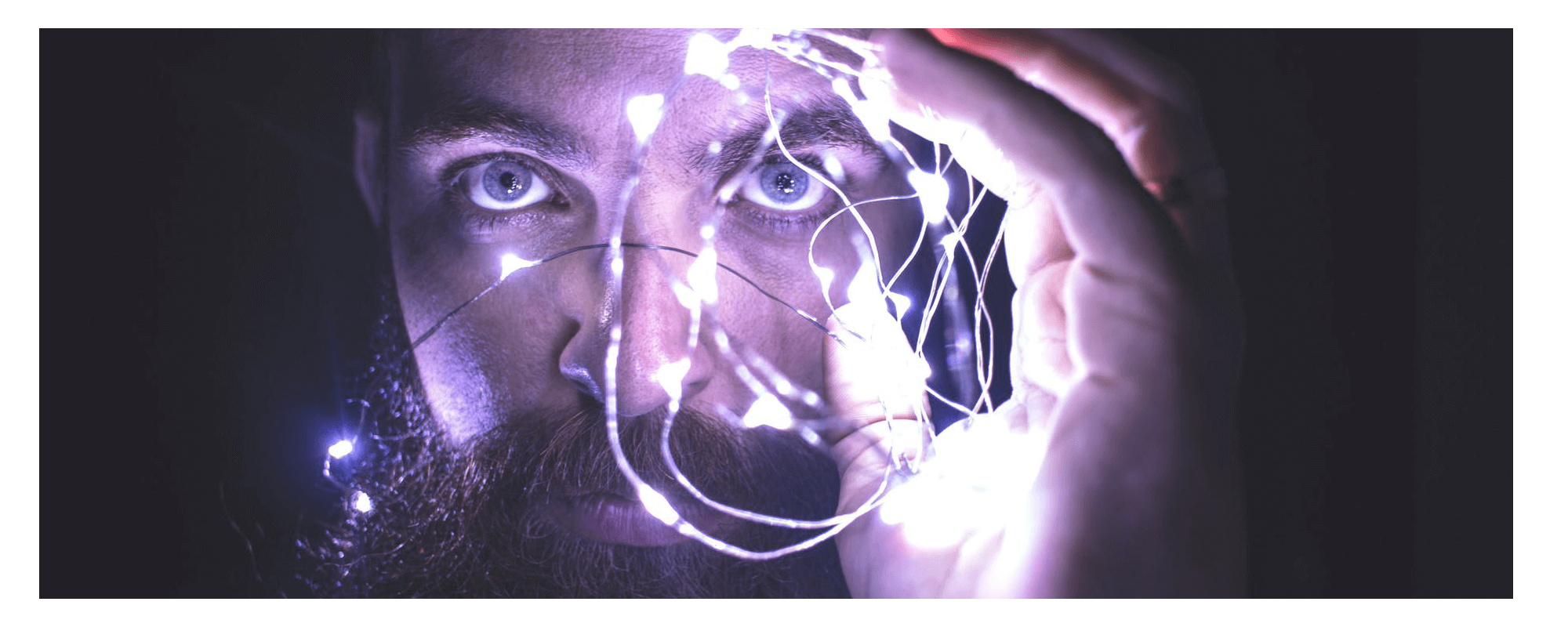 man and silver light bean