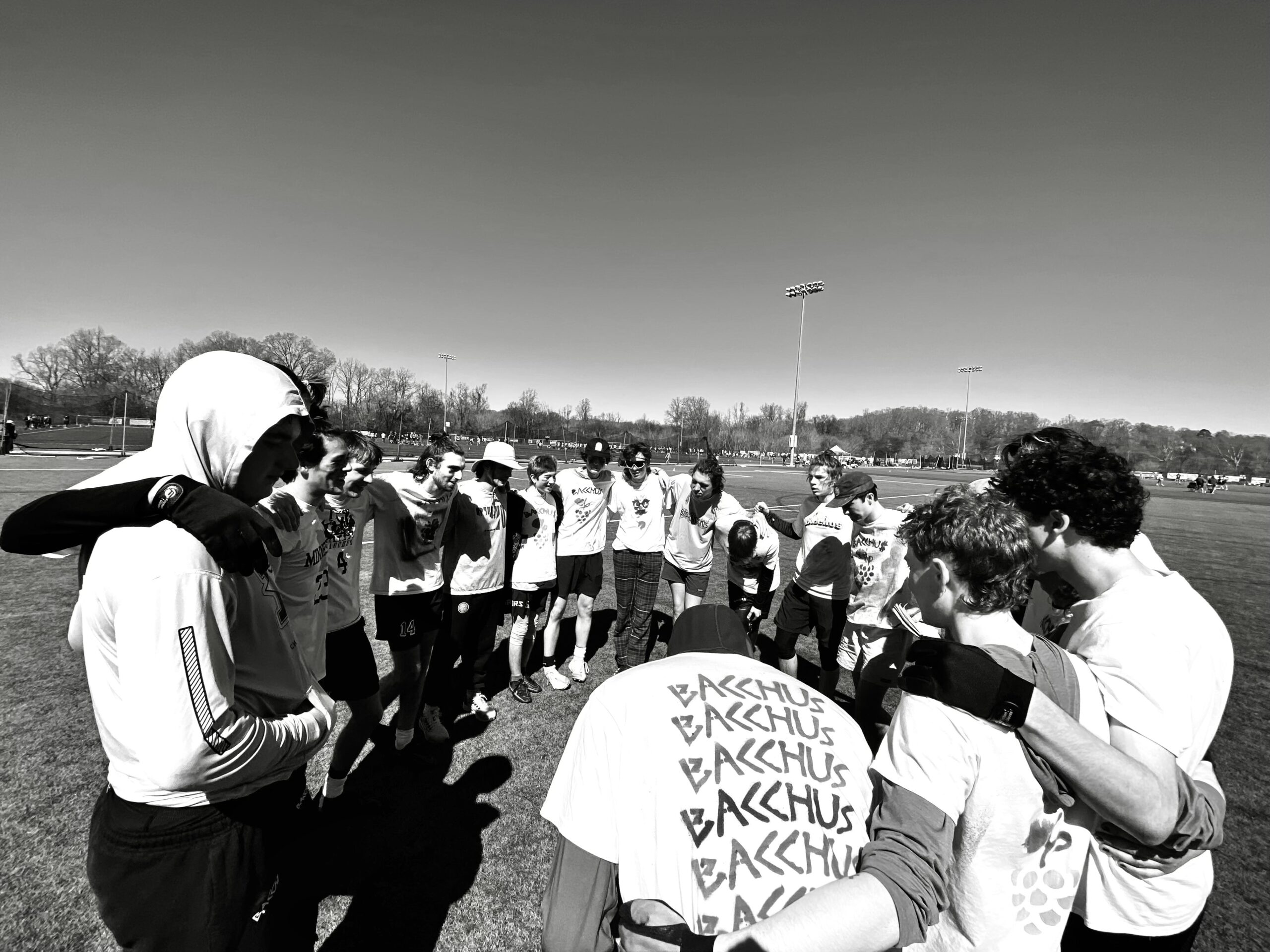 Photo of Bacchus players in a huddle