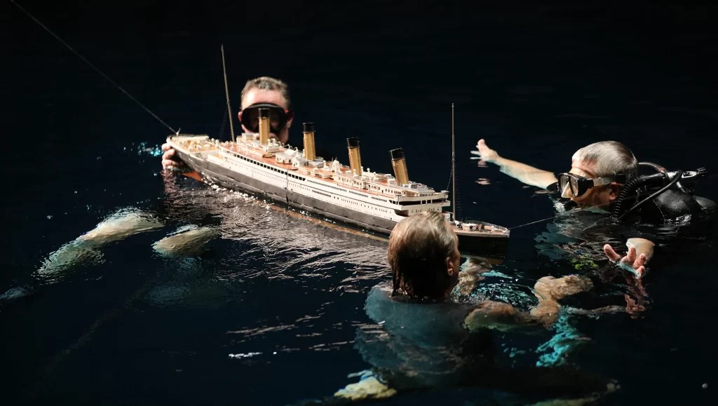 (L to R) Cinematographer Russell Carpenter, and James Cameron filming the ill fated "RMS Titanic" sinking with a scale replica of the actual ship for the film "Titanic" in 1996. Photo Credit: Paramount Pictures