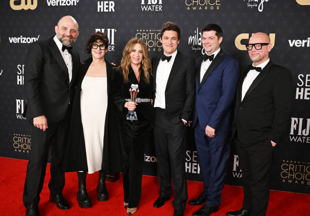 (L-R) (L-R) Joaquim Dos Santos, Amy Pascal, Christina Steinberg, Phil Lord, Christopher Miller, Justin K. Thompson, winner of the Best Animated Feature Award for "Spider-Man: Across the Spider-Verse," during the 29th Annual Critics Choice Awards at Barker Hangar on January 14, 2024 in Santa Monica, California.
Photo Credit: Frazer Harrison/Getty Images