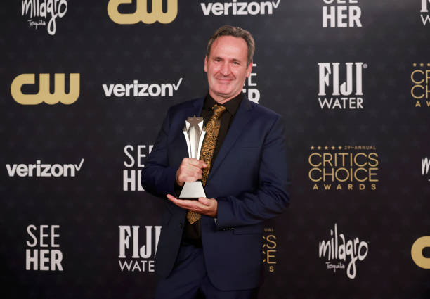 Scott Fisher, winner of the Best Visual Effects Award for 'Oppenheimer,' poses in the press room during the 29th Annual Critics Choice Awards at Barker Hangar on January 14, 2024 in Santa Monica, California. Photo Credit: Emma McIntyre/Getty Images for Critics Choice Association