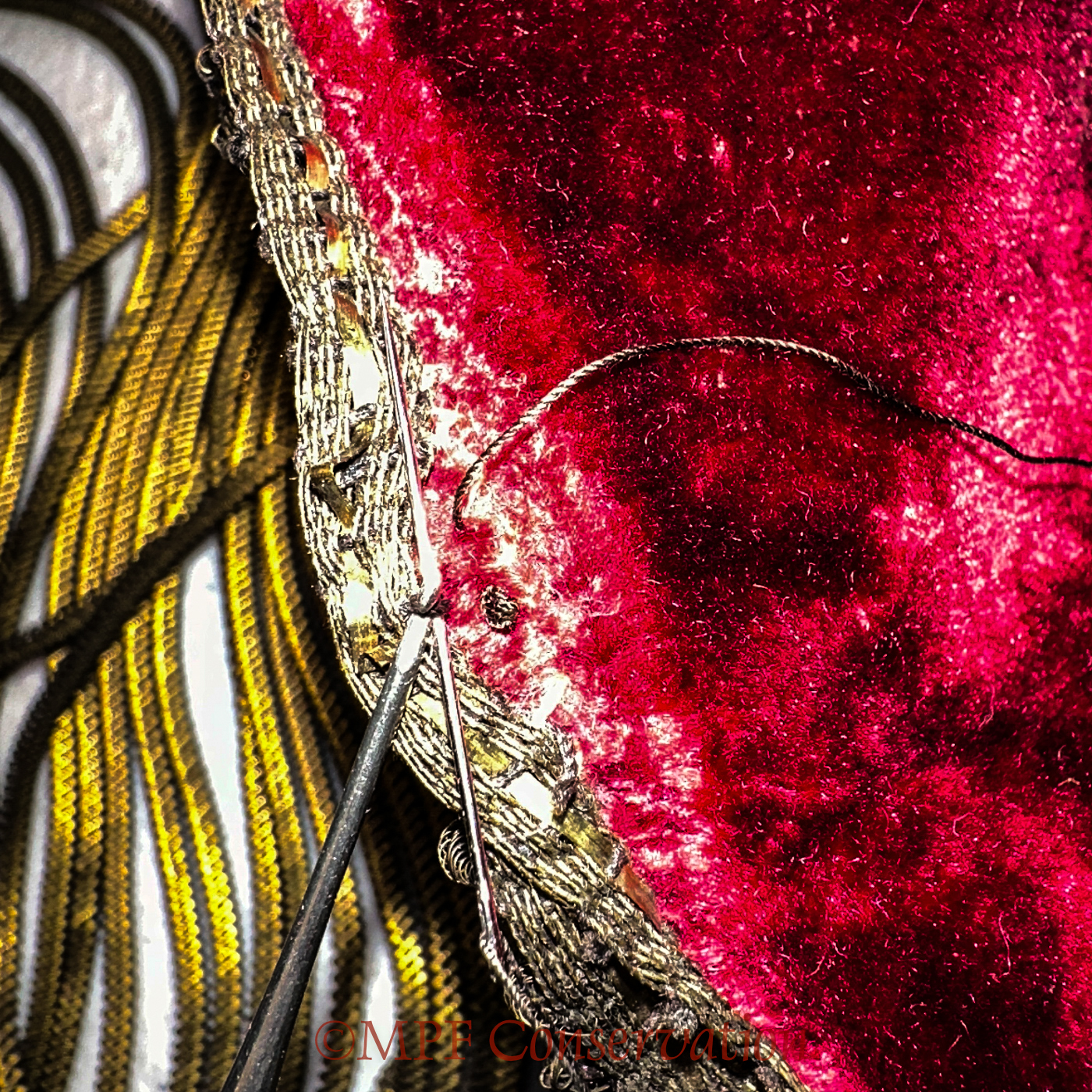 Poor image of pulling the threads up to secure a shorter line.