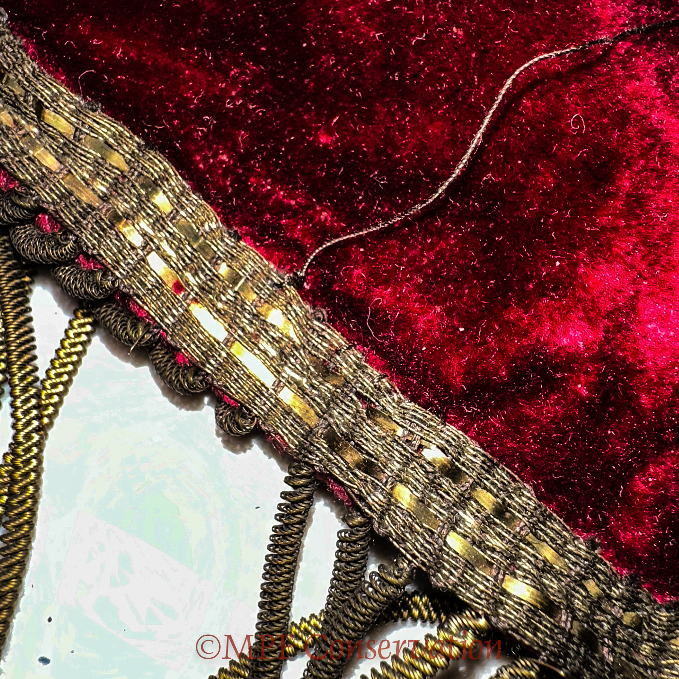 Typing tiny knots that slipped under the trim.