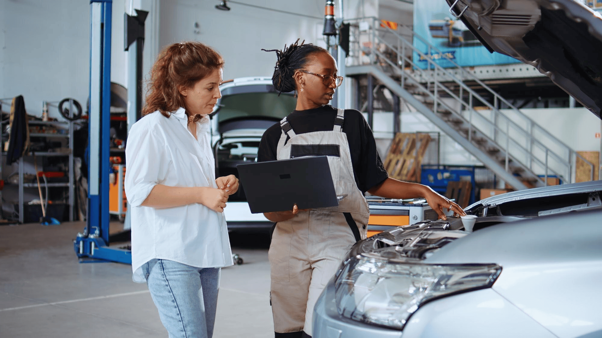 engineer does checkup client car 482257 76153.webp