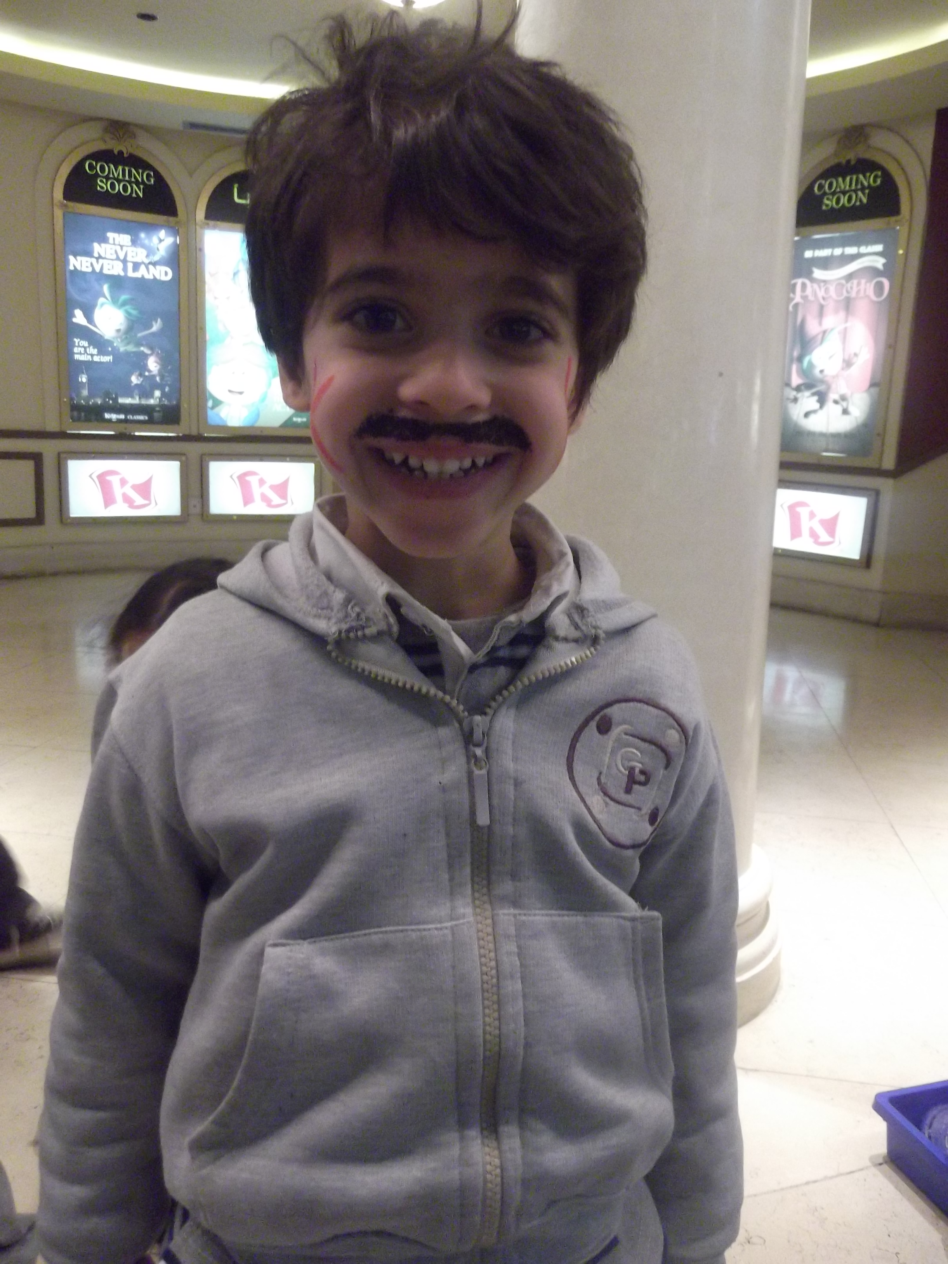 Ahmed loved his face painting. Nice Mustache.