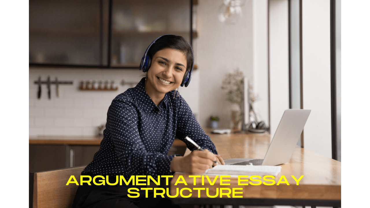 student writing an argumentative essay using a pen