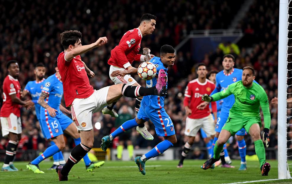 Harry Maguire and Cristiano Ronaldo v Atletico Madrid