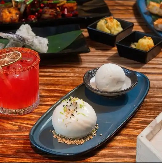 Bao Soy Milk Dessert paired with a perfectly mixed cocktail