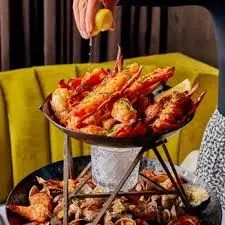 blending fire-roasted seafood towers