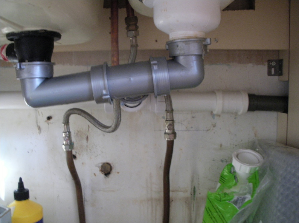 Installed PVC P-trap under kitchen sink - Yelp