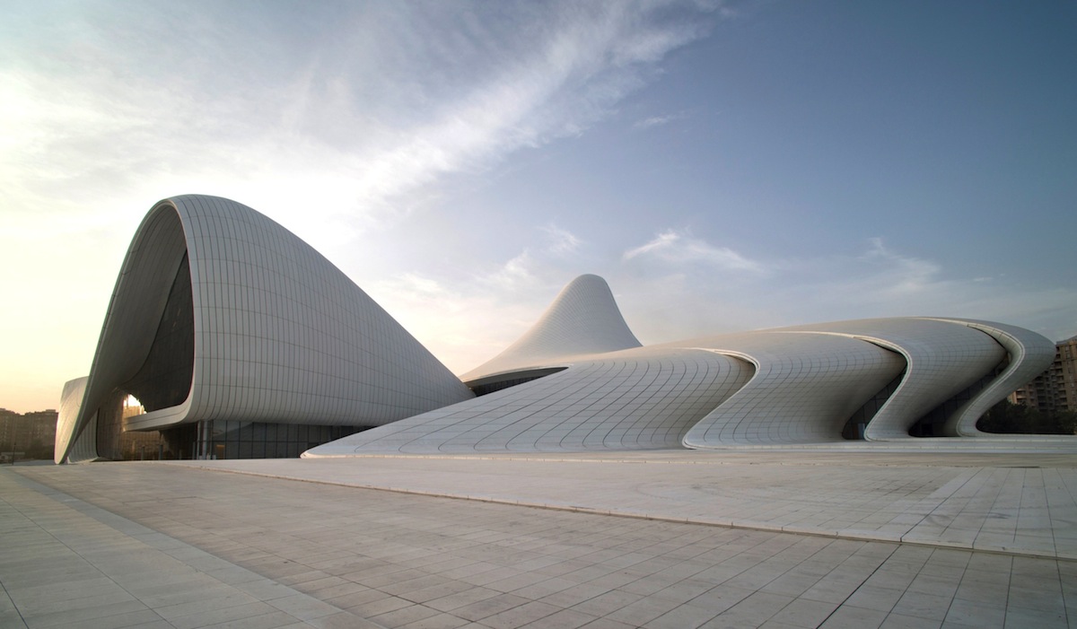 An exemplary work of organic architecture, the convention center's platform roof is rooted by tree trunks wending upwards. The Very Futuristic Heydar Aliyev Center | My Decorative