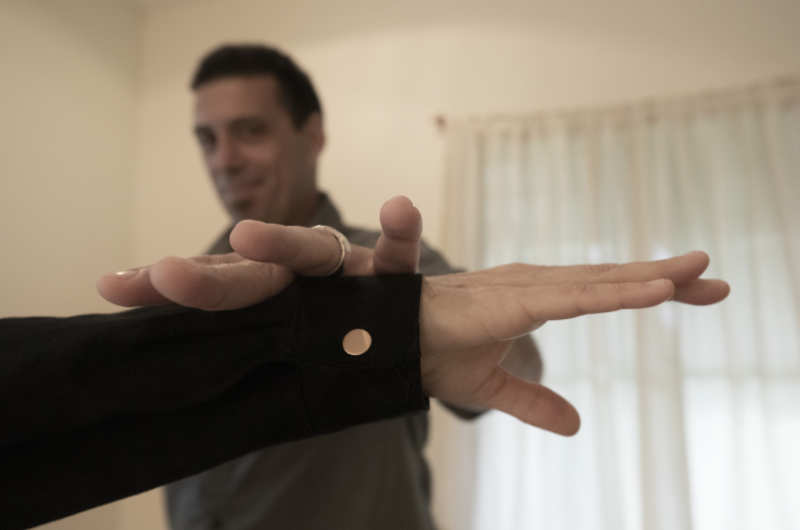 muscle testing using arm to test the bodies internal mechanism of yes or no