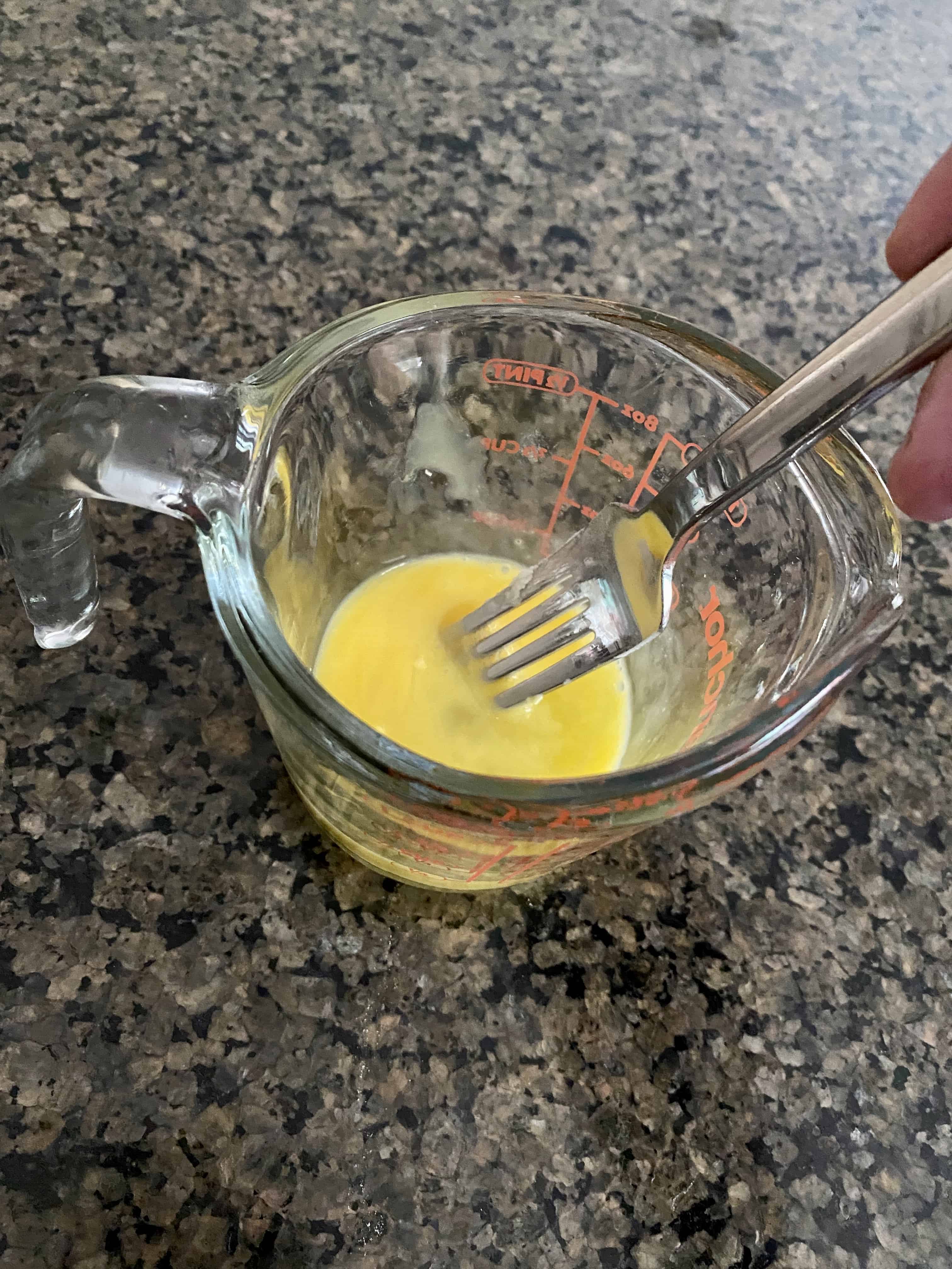 Beat egg for scones