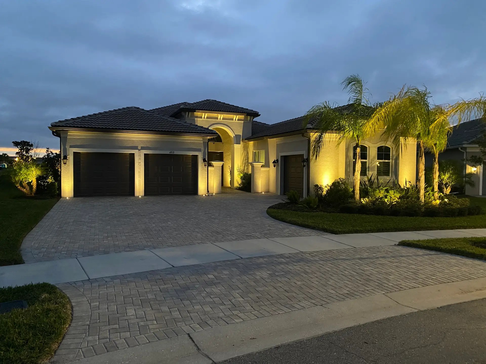 Architectural landscape lighting on a luxury home in Parrish Florida