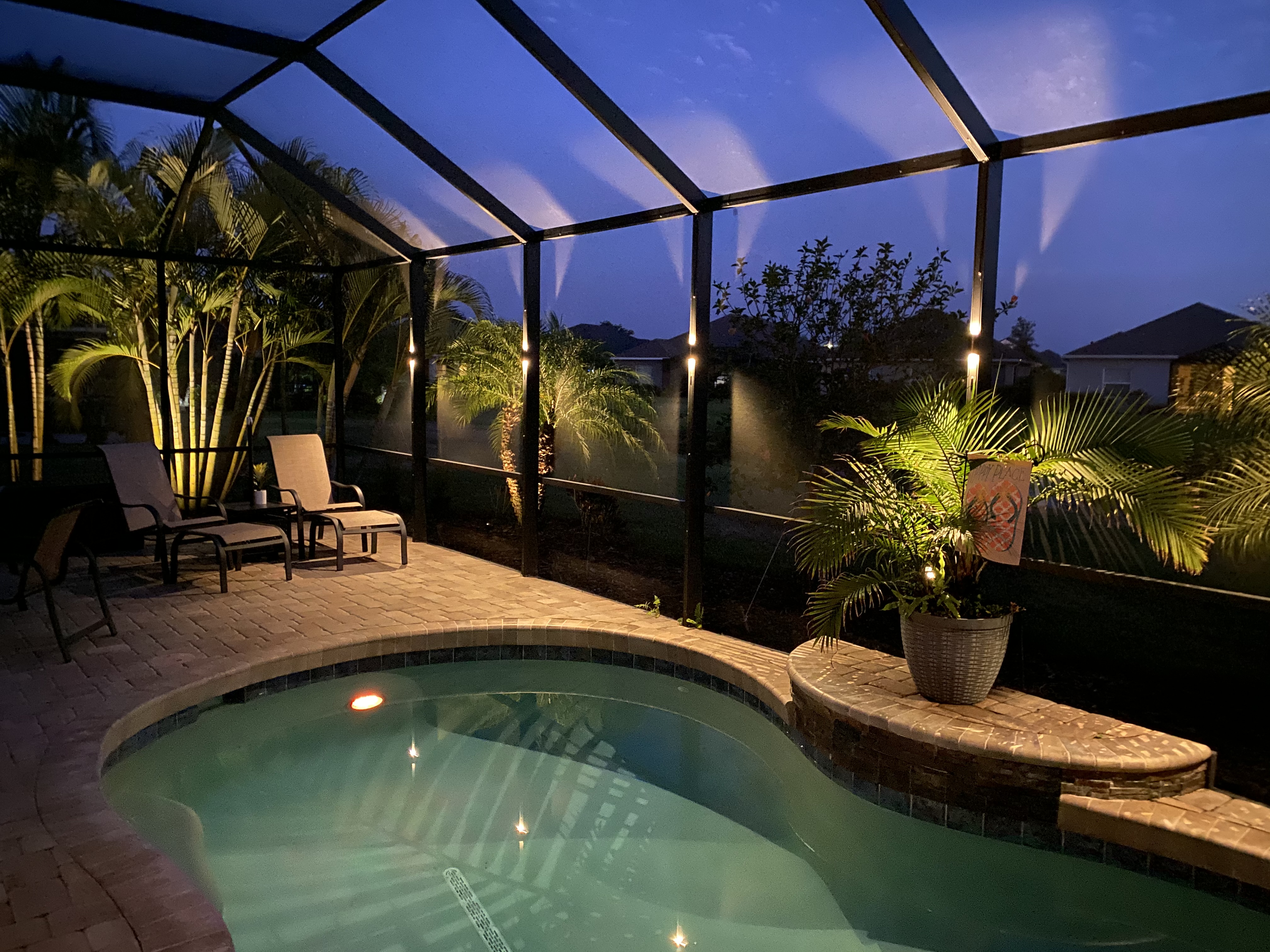 Warm white lanai lighting installation in Parrish Florida