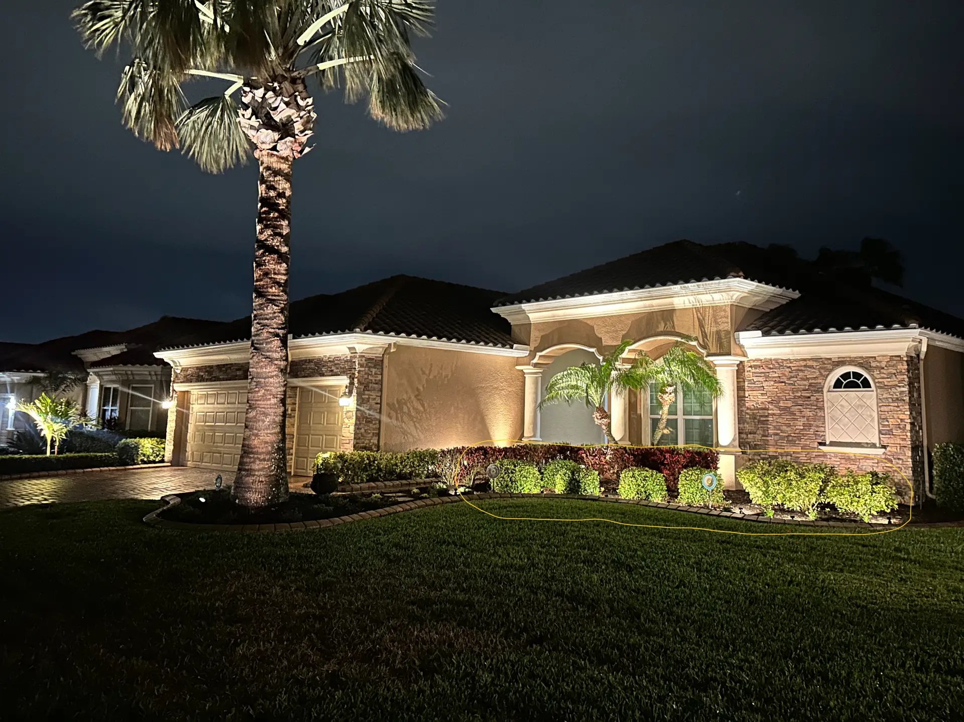 Outdoor landscape lighting on a home in Parrish Florida