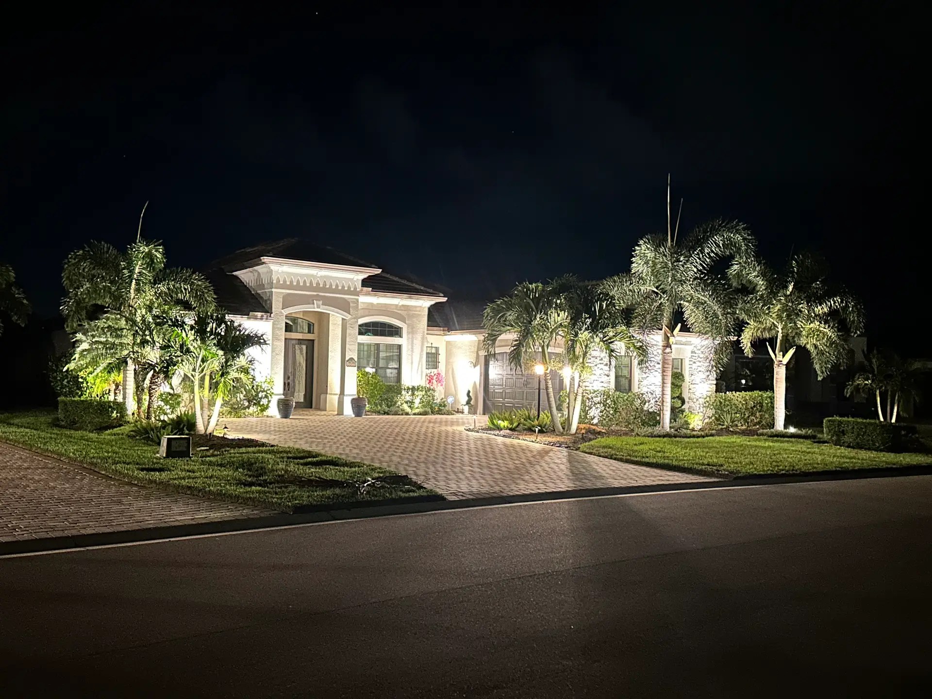 Professional landscape lighting on a Southwest Florida home