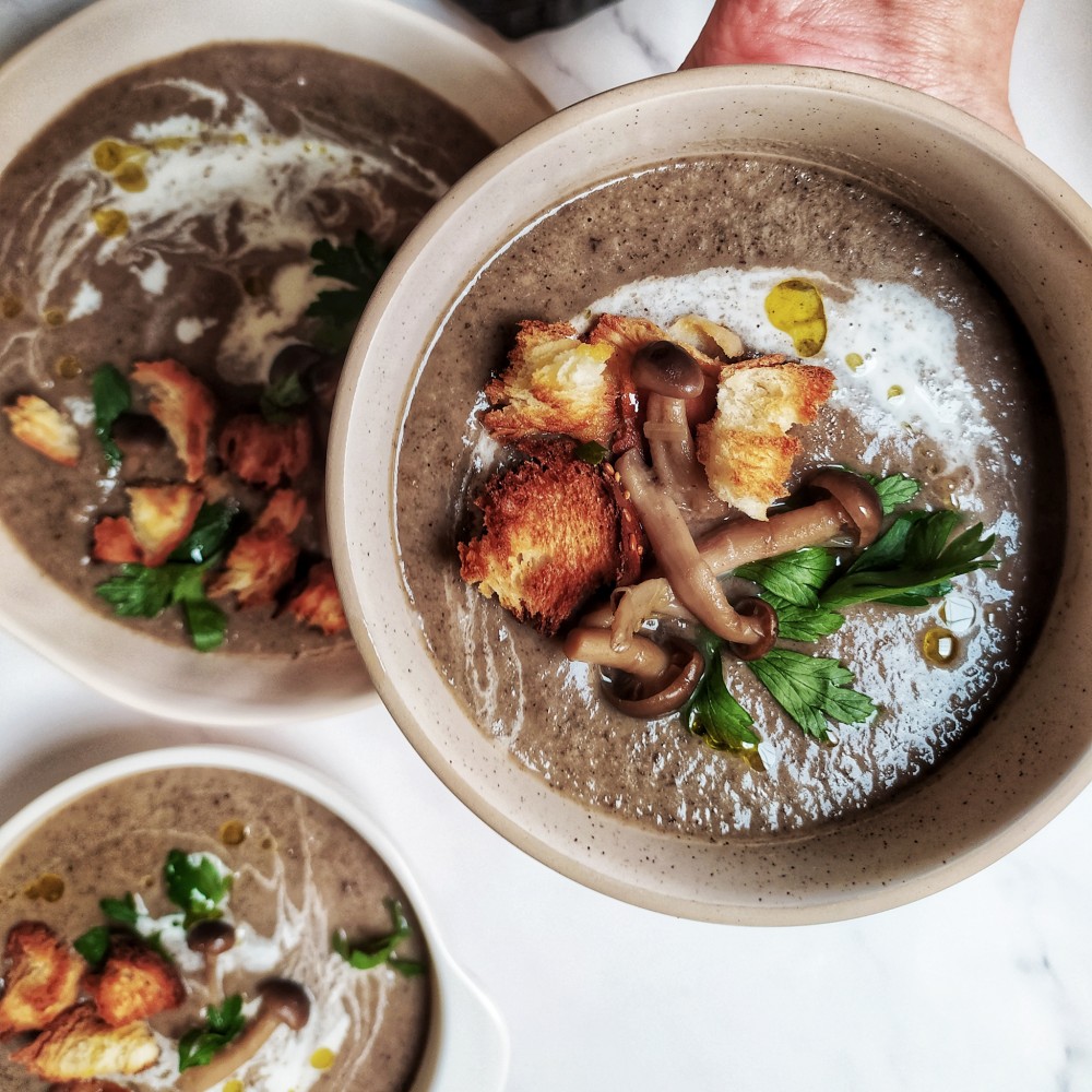 overhead shot of 3 bowls of mushroom soup