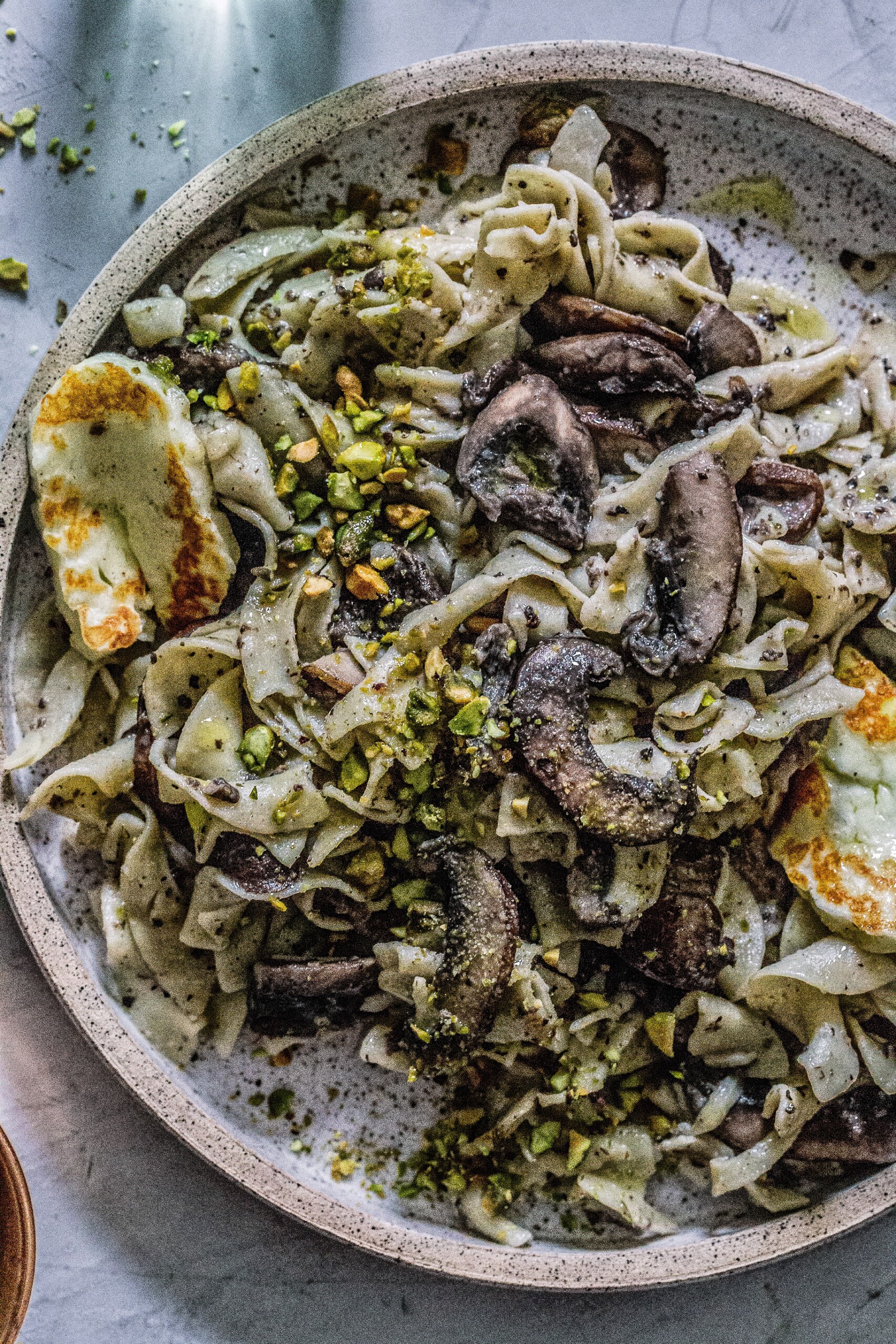 Creamy Mushroom Pasta with Halloumi and Pistachio Dust