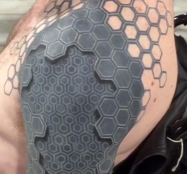 Mind-Bending 3D Tattoo Appears To Turn Man's Arm Into A Machine 596_x_640_jpg