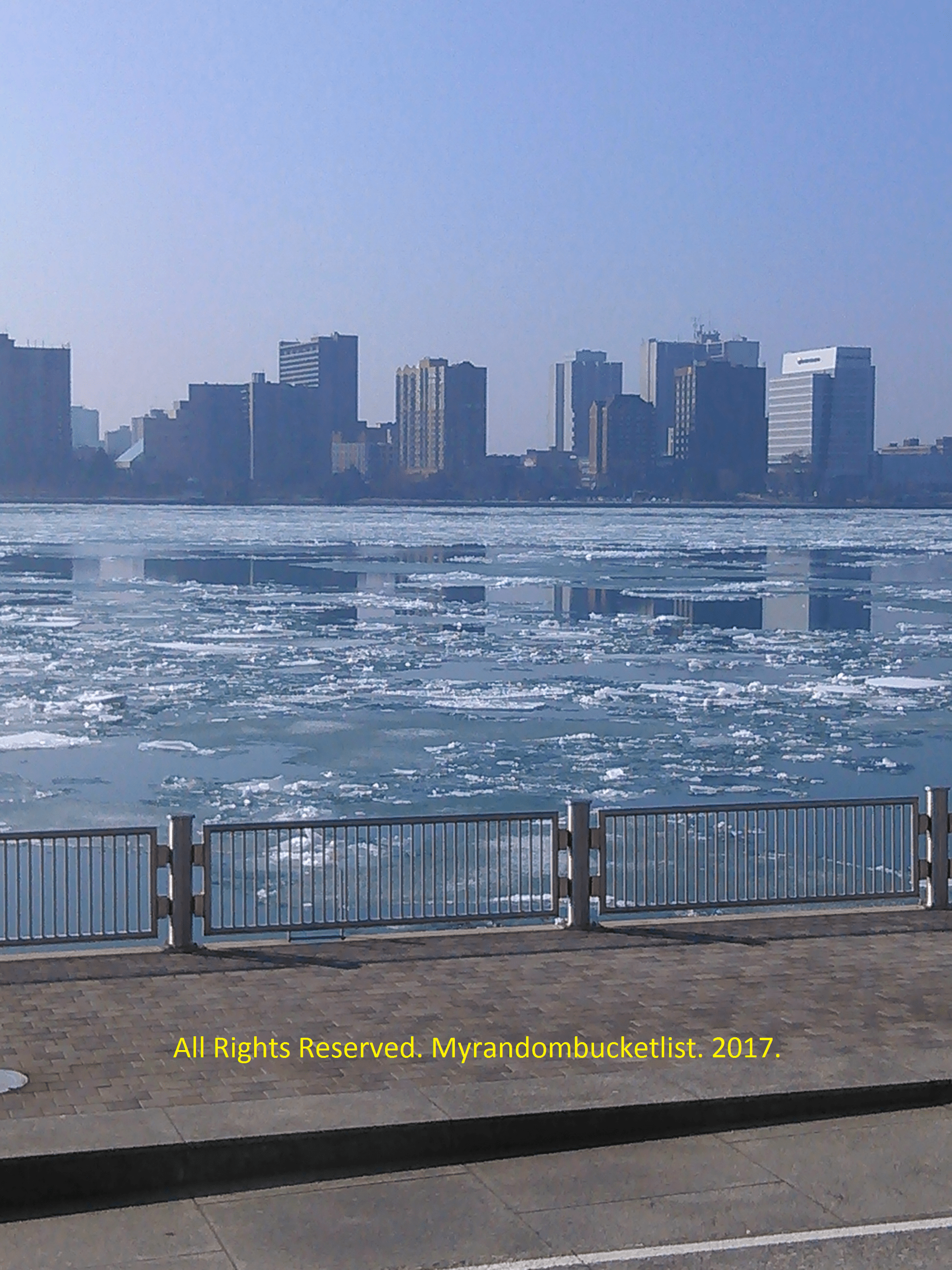 Detroit River on the Riverwalk pathway facing Windsor, Canada.