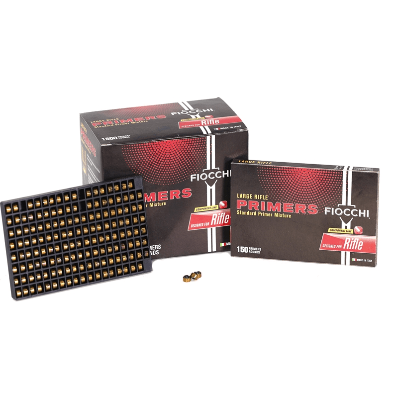 Fiocchi large rifle primers in a box, designed for reloading, with a tray of primers and loose primers visible.