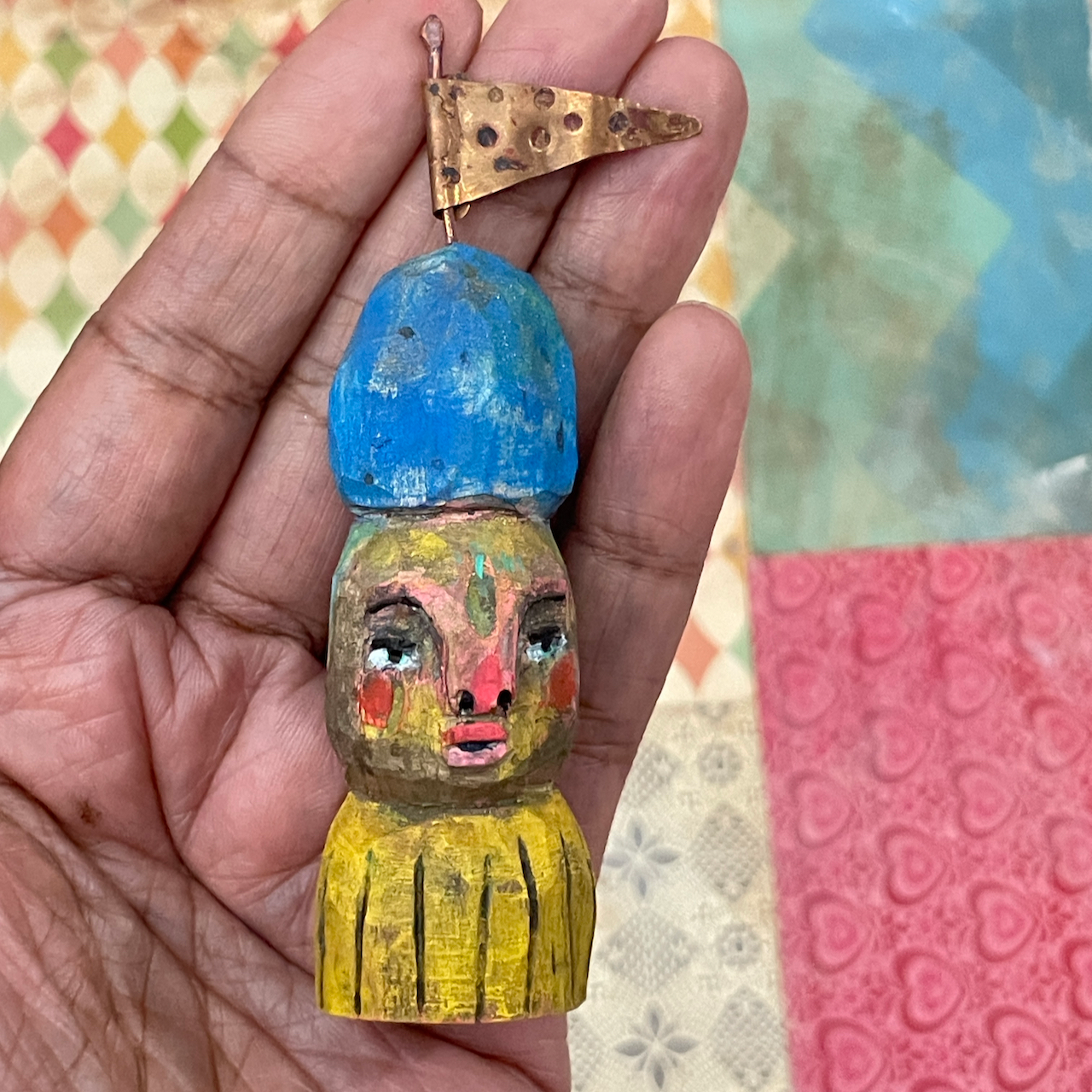 Little flag girl, wood carving