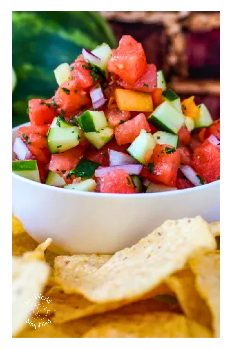 A bowl of easy watermelon salsa served with tortilla chips for a refreshing summer appetizer.