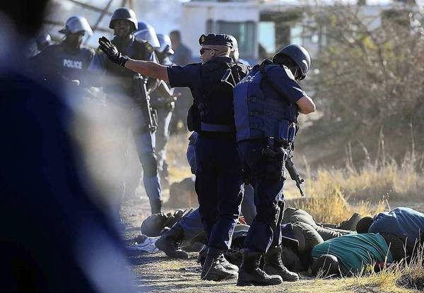 South African Police opens fire on striking miners, 18 killed