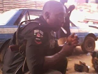 POLICEMAN SMOKING MARIJUANA IN PUBLIC