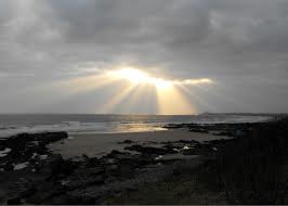 Happiness is like the sun piercing through the clouds