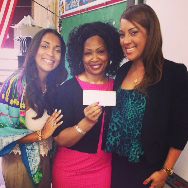 WIFFA Founders Diana & Nancy present Principal Tara Braswell with a check