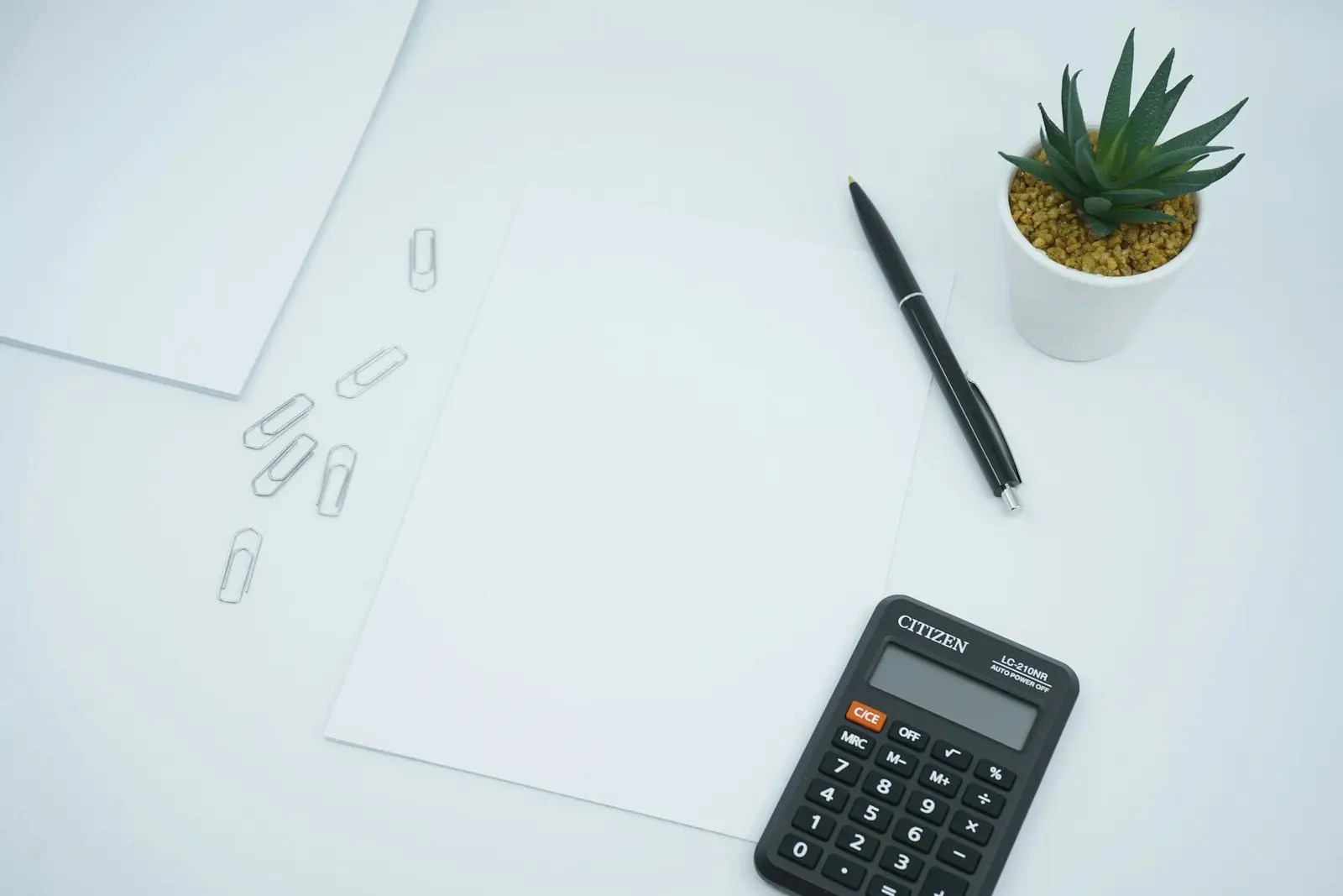 Accounting calculator and paperwork