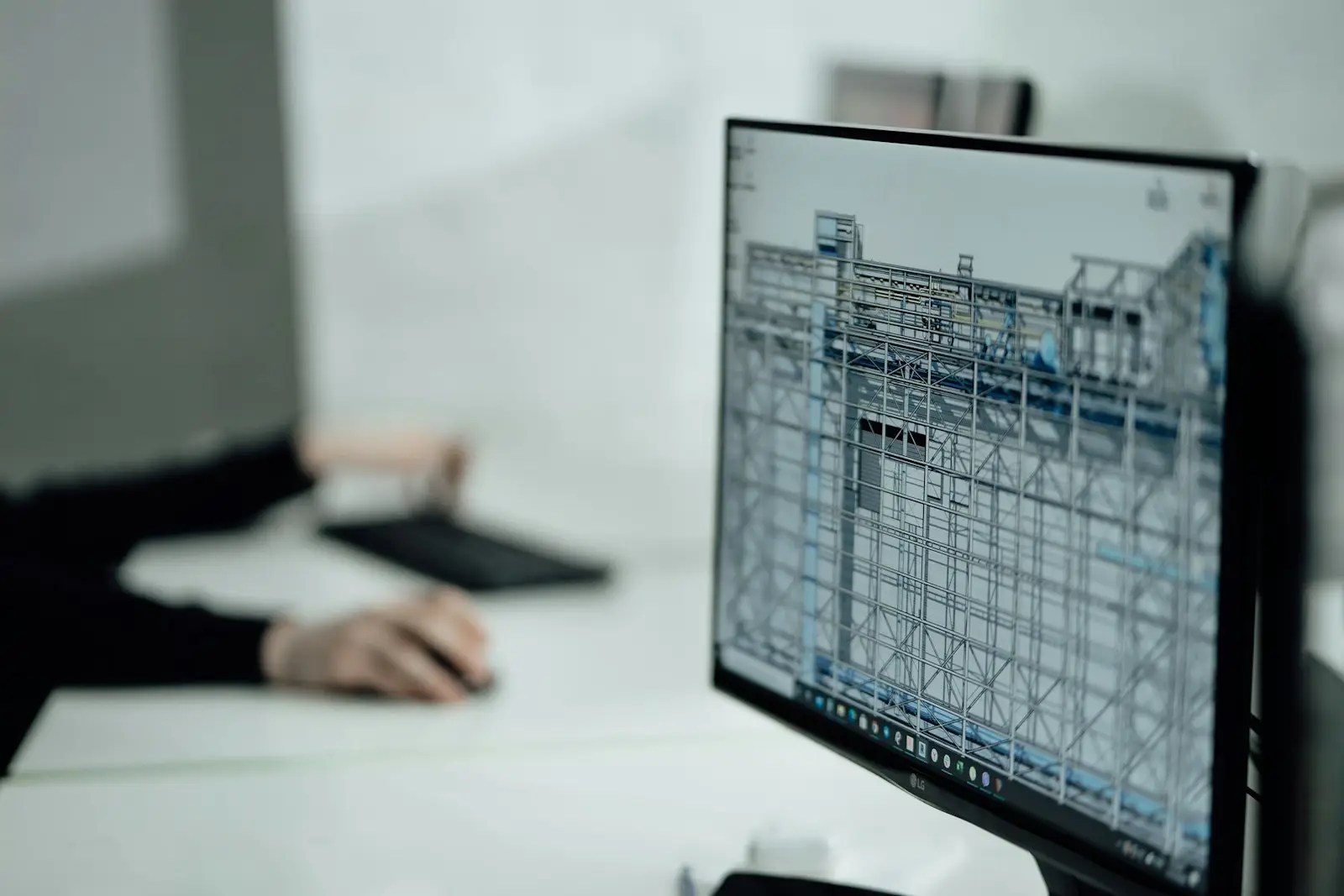 Architect working at modern workstation
