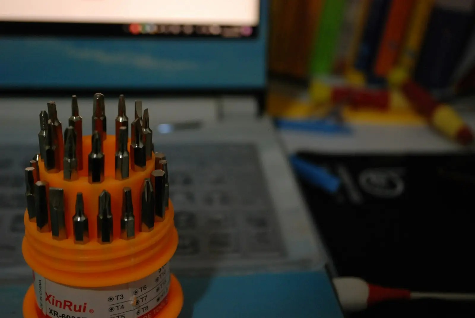 PC repair with screwdriver and laptop
