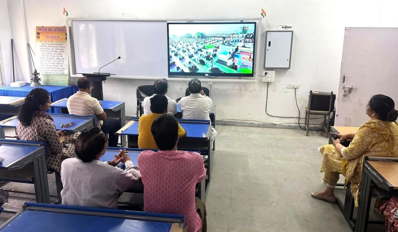 Professors and students practiced yoga in a government college