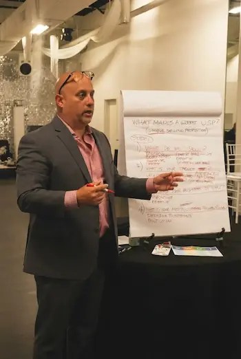 Nathaniel Pool presenting a USP framework at a workshop