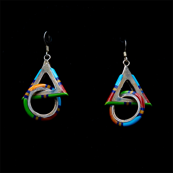 Vintage Navajo sterling silver dangle earrings by Abraham Begay, featuring an interlocking geometric triangle and circle design with vibrant multi-stone channel inlay including turquoise, coral, jet, and shell.