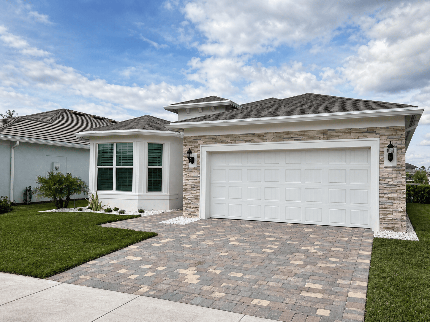 Finished low-maintenance landscape refresh at a Del Webb Tradition home in Port St. Lucie