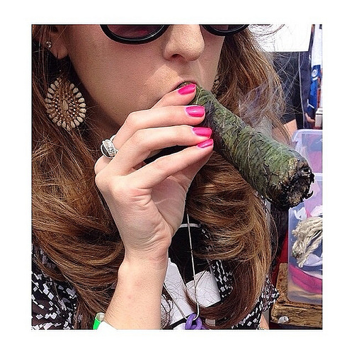 girl smoking large blunt