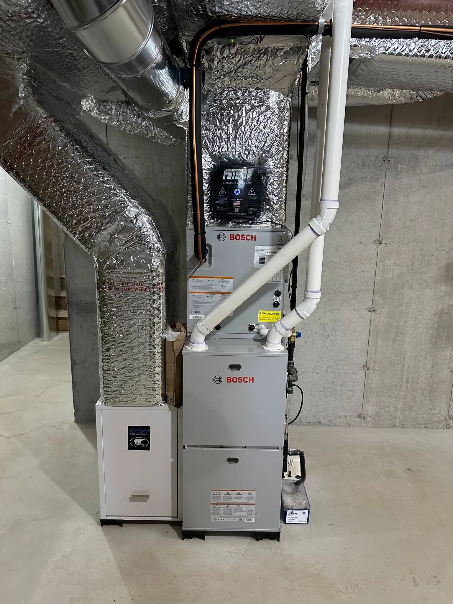 High-efficiency Bosch HVAC heat pump and ductwork installation completed by Nault's Plumbing and Heating in Dunbarton NH