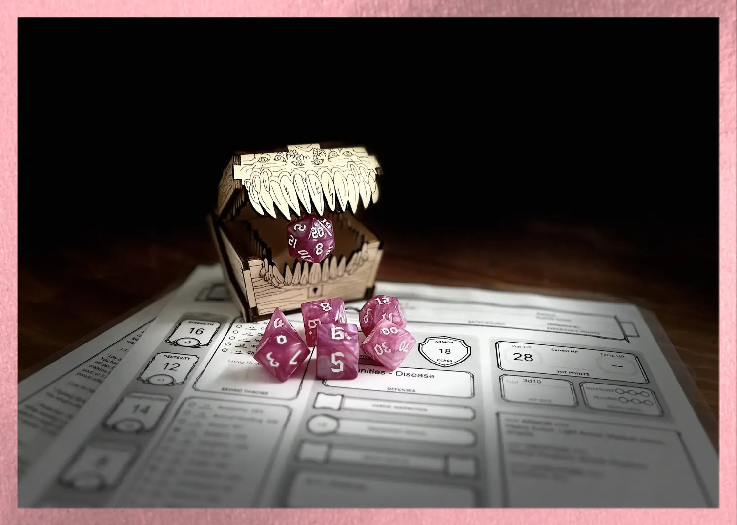 pink swirl polyhedral dice with white numbering sits on a character sheet while a mimic eats the D20