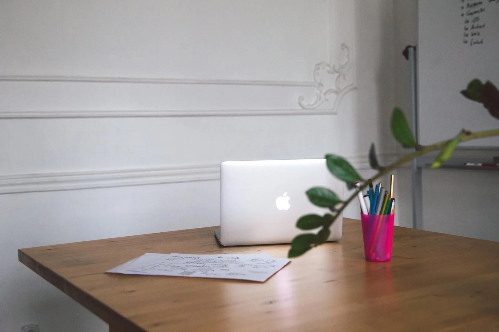 laptop on wooden table