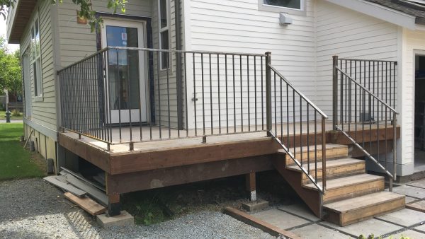 Custom steel deck railing and stair railing fabricated and installed for a residential home in Coquitlam