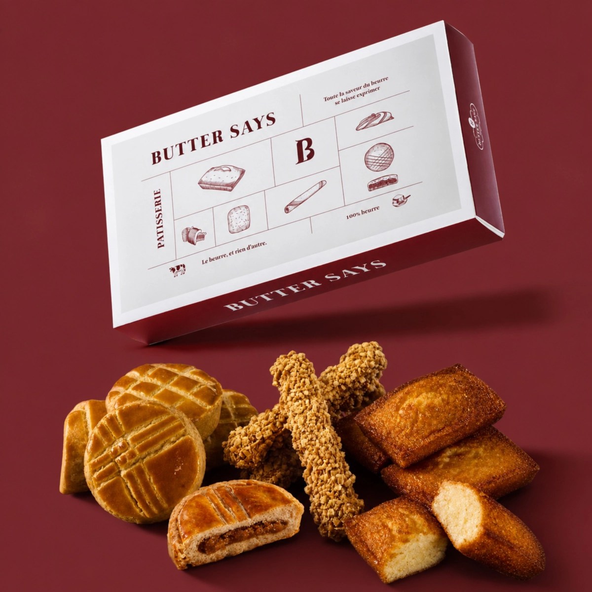 ButterSays「法式綜合禮盒」（12入／售價780元），一次集結艾許奶油費南雪、布列塔尼鳳梨酥及杏仁脆脆三款人氣商品。(圖／ ButterSays 提供)